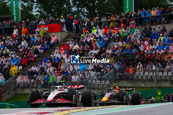 2023-07-01 - 27 HULKENBERG Nico (ger), Haas F1 Team VF-23 Ferrari, 11 PEREZ Sergio (mex), Red Bull Racing RB19, action during the 2023 Formula 1 Rolex Grosser Preis von Osterreich, 2023 Austrian Grand Prix, 9th round of the 2023 Formula One World Championship from June 30 to July 2, 2023 on the Red Bull Ring, in Spielberg, Austria - F1 - AUSTRIAN GRAND PRIX 2023 - FORMULA 1 - MOTORS