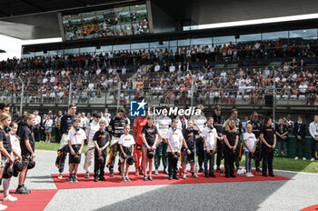 2023-07-02 - Pilots during the minute of silence for Dilano van't Hoff during the 2023 Formula 1 Rolex Grosser Preis von Osterreich, 2023 Austrian Grand Prix, 9th round of the 2023 Formula One World Championship from June 30 to July 2, 2023 on the Red Bull Ring, in Spielberg, Austria - F1 - AUSTRIAN GRAND PRIX 2023 - RACE - FORMULA 1 - MOTORS