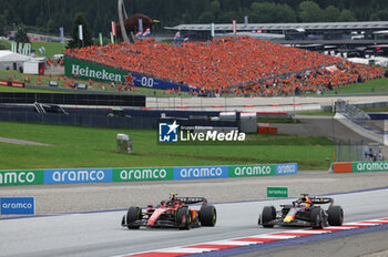 2023-07-02 - 11 PEREZ Sergio (mex), Red Bull Racing RB19, action 55 SAINZ Carlos (spa), Scuderia Ferrari SF-23, action during the 2023 Formula 1 Rolex Grosser Preis von Osterreich, 2023 Austrian Grand Prix, 9th round of the 2023 Formula One World Championship from June 30 to July 2, 2023 on the Red Bull Ring, in Spielberg, Austria - F1 - AUSTRIAN GRAND PRIX 2023 - RACE - FORMULA 1 - MOTORS