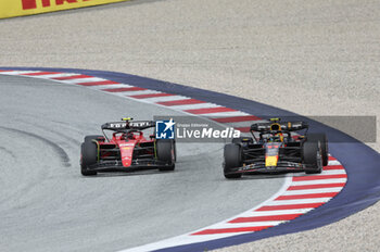 2023-07-02 - 11 PEREZ Sergio (mex), Red Bull Racing RB19, action 55 SAINZ Carlos (spa), Scuderia Ferrari SF-23, action during the 2023 Formula 1 Rolex Grosser Preis von Osterreich, 2023 Austrian Grand Prix, 9th round of the 2023 Formula One World Championship from June 30 to July 2, 2023 on the Red Bull Ring, in Spielberg, Austria - F1 - AUSTRIAN GRAND PRIX 2023 - RACE - FORMULA 1 - MOTORS