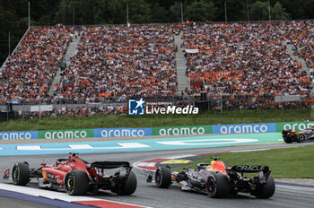 2023-07-02 - 16 LECLERC Charles (mco), Scuderia Ferrari SF-23, action 01 VERSTAPPEN Max (nld), Red Bull Racing RB19, action during the 2023 Formula 1 Rolex Grosser Preis von Osterreich, 2023 Austrian Grand Prix, 9th round of the 2023 Formula One World Championship from June 30 to July 2, 2023 on the Red Bull Ring, in Spielberg, Austria - F1 - AUSTRIAN GRAND PRIX 2023 - RACE - FORMULA 1 - MOTORS