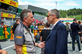 2023-07-02 - ISOLA Mario (ita), Motorsport Racing Manager of Pirelli, DOMENICALI Stefano (ita), Chairman and CEO Formula One Group FOG, portrait during the 2023 Formula 1 Rolex Grosser Preis von Osterreich, 2023 Austrian Grand Prix, 9th round of the 2023 Formula One World Championship from June 30 to July 2, 2023 on the Red Bull Ring, in Spielberg, Austria - F1 - AUSTRIAN GRAND PRIX 2023 - RACE - FORMULA 1 - MOTORS