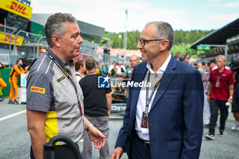 2023-07-02 - ISOLA Mario (ita), Motorsport Racing Manager of Pirelli, DOMENICALI Stefano (ita), Chairman and CEO Formula One Group FOG, portrait during the 2023 Formula 1 Rolex Grosser Preis von Osterreich, 2023 Austrian Grand Prix, 9th round of the 2023 Formula One World Championship from June 30 to July 2, 2023 on the Red Bull Ring, in Spielberg, Austria - F1 - AUSTRIAN GRAND PRIX 2023 - RACE - FORMULA 1 - MOTORS