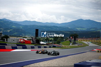2023-07-02 - 11 PEREZ Sergio (mex), Red Bull Racing RB19, 63 RUSSELL George (gbr), Mercedes AMG F1 Team W14, action during the 2023 Formula 1 Rolex Grosser Preis von Osterreich, 2023 Austrian Grand Prix, 9th round of the 2023 Formula One World Championship from June 30 to July 2, 2023 on the Red Bull Ring, in Spielberg, Austria - F1 - AUSTRIAN GRAND PRIX 2023 - RACE - FORMULA 1 - MOTORS