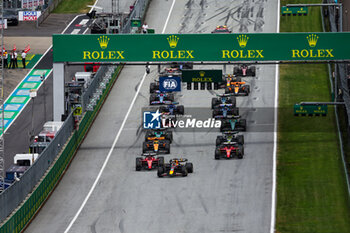 2023-07-02 - Start of the race: 01 VERSTAPPEN Max (nld), Red Bull Racing RB19, 16 LECLERC Charles (mco), Scuderia Ferrari SF-23, 55 SAINZ Carlos (spa), Scuderia Ferrari SF-23, 04 NORRIS Lando (gbr), McLaren F1 Team MCL60, action during the 2023 Formula 1 Rolex Grosser Preis von Osterreich, 2023 Austrian Grand Prix, 9th round of the 2023 Formula One World Championship from June 30 to July 2, 2023 on the Red Bull Ring, in Spielberg, Austria - F1 - AUSTRIAN GRAND PRIX 2023 - RACE - FORMULA 1 - MOTORS