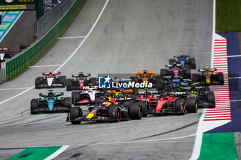 2023-07-02 - Start of the race: 01 VERSTAPPEN Max (nld), Red Bull Racing RB19, 16 LECLERC Charles (mco), Scuderia Ferrari SF-23, 55 SAINZ Carlos (spa), Scuderia Ferrari SF-23, 04 NORRIS Lando (gbr), McLaren F1 Team MCL60, action during the 2023 Formula 1 Rolex Grosser Preis von Osterreich, 2023 Austrian Grand Prix, 9th round of the 2023 Formula One World Championship from June 30 to July 2, 2023 on the Red Bull Ring, in Spielberg, Austria - F1 - AUSTRIAN GRAND PRIX 2023 - RACE - FORMULA 1 - MOTORS