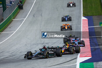 2023-07-02 - 63 RUSSELL George (gbr), Mercedes AMG F1 Team W14, 11 PEREZ Sergio (mex), Red Bull Racing RB19, action during the 2023 Formula 1 Rolex Grosser Preis von Osterreich, 2023 Austrian Grand Prix, 9th round of the 2023 Formula One World Championship from June 30 to July 2, 2023 on the Red Bull Ring, in Spielberg, Austria - F1 - AUSTRIAN GRAND PRIX 2023 - RACE - FORMULA 1 - MOTORS