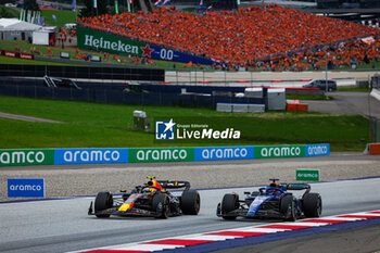 2023-07-02 - 11 PEREZ Sergio (mex), Red Bull Racing RB19, 23 ALBON Alexander (tha), Williams Racing FW45, action during the 2023 Formula 1 Rolex Grosser Preis von Osterreich, 2023 Austrian Grand Prix, 9th round of the 2023 Formula One World Championship from June 30 to July 2, 2023 on the Red Bull Ring, in Spielberg, Austria - F1 - AUSTRIAN GRAND PRIX 2023 - RACE - FORMULA 1 - MOTORS