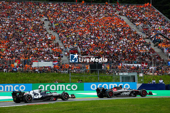 2023-07-02 - 21 DE VRIES Nyck (ned), Scuderia AlphaTauri AT04, 20 MAGNUSSEN Kevin (den), Haas F1 Team VF-23 Ferrari, action during the 2023 Formula 1 Rolex Grosser Preis von Osterreich, 2023 Austrian Grand Prix, 9th round of the 2023 Formula One World Championship from June 30 to July 2, 2023 on the Red Bull Ring, in Spielberg, Austria - F1 - AUSTRIAN GRAND PRIX 2023 - RACE - FORMULA 1 - MOTORS