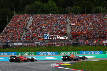 2023-07-02 - 01 VERSTAPPEN Max (nld), Red Bull Racing RB19, 16 LECLERC Charles (mco), Scuderia Ferrari SF-23, action during the 2023 Formula 1 Rolex Grosser Preis von Osterreich, 2023 Austrian Grand Prix, 9th round of the 2023 Formula One World Championship from June 30 to July 2, 2023 on the Red Bull Ring, in Spielberg, Austria - F1 - AUSTRIAN GRAND PRIX 2023 - RACE - FORMULA 1 - MOTORS