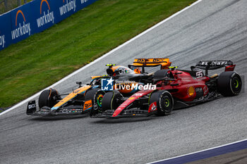 2023-07-02 - 04 NORRIS Lando (gbr), McLaren F1 Team MCL60, 55 SAINZ Carlos (spa), Scuderia Ferrari SF-23, action during the 2023 Formula 1 Rolex Grosser Preis von Osterreich, 2023 Austrian Grand Prix, 9th round of the 2023 Formula One World Championship from June 30 to July 2, 2023 on the Red Bull Ring, in Spielberg, Austria - F1 - AUSTRIAN GRAND PRIX 2023 - RACE - FORMULA 1 - MOTORS