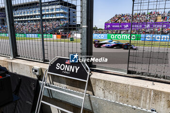 2023-07-07 - HAYES Sonny name on the pitwall of the fictional Apex APXGP team for the F1 movie by Apple Studios / Bruckheimer Films, with 31 OCON Esteban (fra), Alpine F1 Team A523, action during the 2023 Formula 1 Aramco British Grand Prix, 10th round of the 2023 Formula One World Championship from July 7 to 9, 2023 on the Silverstone Circuit, in Silverstone, United Kingdom - F1 - BRITISH GRAND PRIX 2023 - FORMULA 1 - MOTORS