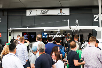 2023-07-08 - crowd in front of the garage of Sonny Hayes of the fictional team APEX APXGP for the F1 movie by Apple Studios / Bruckheimer Films with Brad Pitt during the 2023 Formula 1 Aramco British Grand Prix, 10th round of the 2023 Formula One World Championship from July 7 to 9, 2023 on the Silverstone Circuit, in Silverstone, United Kingdom - F1 - BRITISH GRAND PRIX 2023 - FORMULA 1 - MOTORS