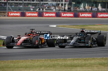 2023-07-09 - 16 LECLERC Charles (mco), Scuderia Ferrari SF-23, action 63 RUSSELL George (gbr), Mercedes AMG F1 Team W14, action during the 2023 Formula 1 Aramco British Grand Prix, 10th round of the 2023 Formula One World Championship from July 7 to 9, 2023 on the Silverstone Circuit, in Silverstone, United Kingdom - F1 - BRITISH GRAND PRIX 2023 - RACE - FORMULA 1 - MOTORS