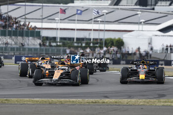 2023-07-09 - 04 NORRIS Lando (gbr), McLaren F1 Team MCL60, action 01 VERSTAPPEN Max (nld), Red Bull Racing RB19, action 81 PIASTRI Oscar (aus), McLaren F1 Team MCL60, action start of the race, depart, during the 2023 Formula 1 Aramco British Grand Prix, 10th round of the 2023 Formula One World Championship from July 7 to 9, 2023 on the Silverstone Circuit, in Silverstone, United Kingdom - F1 - BRITISH GRAND PRIX 2023 - RACE - FORMULA 1 - MOTORS