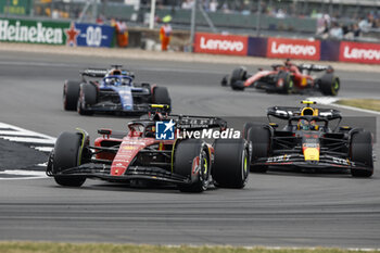 2023-07-09 - 55 SAINZ Carlos (spa), Scuderia Ferrari SF-23, action 11 PEREZ Sergio (mex), Red Bull Racing RB19, action during the 2023 Formula 1 Aramco British Grand Prix, 10th round of the 2023 Formula One World Championship from July 7 to 9, 2023 on the Silverstone Circuit, in Silverstone, United Kingdom - F1 - BRITISH GRAND PRIX 2023 - RACE - FORMULA 1 - MOTORS