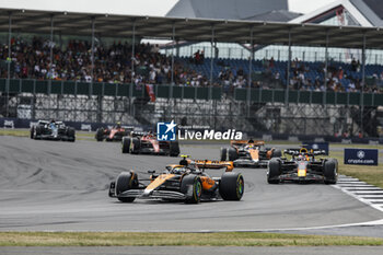 2023-07-09 - 04 NORRIS Lando (gbr), McLaren F1 Team MCL60, action 01 VERSTAPPEN Max (nld), Red Bull Racing RB19, action 81 PIASTRI Oscar (aus), McLaren F1 Team MCL60, action during the 2023 Formula 1 Aramco British Grand Prix, 10th round of the 2023 Formula One World Championship from July 7 to 9, 2023 on the Silverstone Circuit, in Silverstone, United Kingdom - F1 - BRITISH GRAND PRIX 2023 - RACE - FORMULA 1 - MOTORS
