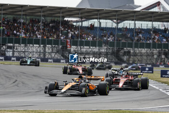 2023-07-09 - 81 PIASTRI Oscar (aus), McLaren F1 Team MCL60, action 16 LECLERC Charles (mco), Scuderia Ferrari SF-23, action during the 2023 Formula 1 Aramco British Grand Prix, 10th round of the 2023 Formula One World Championship from July 7 to 9, 2023 on the Silverstone Circuit, in Silverstone, United Kingdom - F1 - BRITISH GRAND PRIX 2023 - RACE - FORMULA 1 - MOTORS