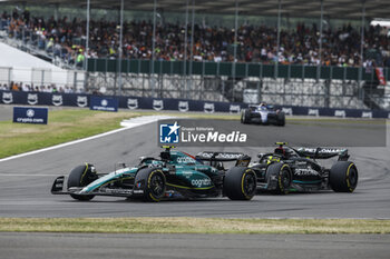 2023-07-09 - 14 ALONSO Fernando (spa), Aston Martin F1 Team AMR23, action 44 HAMILTON Lewis (gbr), Mercedes AMG F1 Team W14, action during the 2023 Formula 1 Aramco British Grand Prix, 10th round of the 2023 Formula One World Championship from July 7 to 9, 2023 on the Silverstone Circuit, in Silverstone, United Kingdom - F1 - BRITISH GRAND PRIX 2023 - RACE - FORMULA 1 - MOTORS