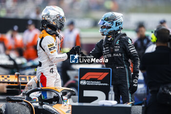 2023-07-09 - NORRIS Lando (gbr), McLaren F1 Team MCL60, portrait RUSSELL George (gbr), Mercedes AMG F1 Team W14, portrait during the 2023 Formula 1 Aramco British Grand Prix, 10th round of the 2023 Formula One World Championship from July 7 to 9, 2023 on the Silverstone Circuit, in Silverstone, United Kingdom - F1 - BRITISH GRAND PRIX 2023 - RACE - FORMULA 1 - MOTORS