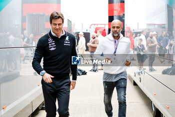 2023-07-09 - WOLFF Toto (aut), Team Principal & CEO of Mercedes AMG F1 Team, portrait Pep Guardiola coach of Manchester City football team during the 2023 Formula 1 Aramco British Grand Prix, 10th round of the 2023 Formula One World Championship from July 7 to 9, 2023 on the Silverstone Circuit, in Silverstone, United Kingdom - F1 - BRITISH GRAND PRIX 2023 - RACE - FORMULA 1 - MOTORS