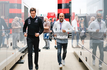 2023-07-09 - WOLFF Toto (aut), Team Principal & CEO of Mercedes AMG F1 Team, portrait Pep Guardiola coach of Manchester City football team during the 2023 Formula 1 Aramco British Grand Prix, 10th round of the 2023 Formula One World Championship from July 7 to 9, 2023 on the Silverstone Circuit, in Silverstone, United Kingdom - F1 - BRITISH GRAND PRIX 2023 - RACE - FORMULA 1 - MOTORS