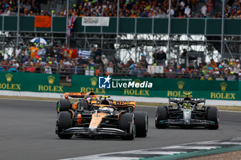 2023-07-09 - 04 NORRIS Lando (gbr), McLaren F1 Team MCL60, action 44 HAMILTON Lewis (gbr), Mercedes AMG F1 Team W14, action during the 2023 Formula 1 Aramco British Grand Prix, 10th round of the 2023 Formula One World Championship from July 7 to 9, 2023 on the Silverstone Circuit, in Silverstone, United Kingdom - F1 - BRITISH GRAND PRIX 2023 - RACE - FORMULA 1 - MOTORS
