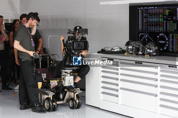 2023-07-09 - Film camera APEX APXGP Team crew filming in the garage for the F1 movie by Apple Studios / Bruckheimer Films during the 2023 Formula 1 Aramco British Grand Prix, 10th round of the 2023 Formula One World Championship from July 7 to 9, 2023 on the Silverstone Circuit, in Silverstone, United Kingdom - F1 - BRITISH GRAND PRIX 2023 - RACE - FORMULA 1 - MOTORS