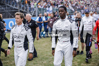 2023-07-09 - PITT Brad (USA), actor playing Sonny Hayes, driver of the fictional Apex APXGP team in the F1 movie by Apple Studios / Bruckheimer Films, portrait IDRIS Damson Alade-Bo (GBR), actor playing Joshua Pearce, driver of the fictional Apex APXGP team in the F1 movie by Apple Studios / Bruckheimer Films, portrait OCON Esteban (fra), Alpine F1 Team A523, portrait during the 2023 Formula 1 Aramco British Grand Prix, 10th round of the 2023 Formula One World Championship from July 7 to 9, 2023 on the Silverstone Circuit, in Silverstone, United Kingdom - F1 - BRITISH GRAND PRIX 2023 - RACE - FORMULA 1 - MOTORS