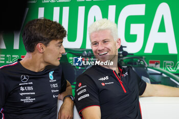 2023-07-20 - HULKENBERG Nico (ger), Haas F1 Team VF-23 Ferrari, RUSSELL George (gbr), Mercedes AMG F1 Team W14, portrait during the 2023 Formula 1 Qatar Airways Hungarian Grand Prix, 11th round of the 2023 Formula One World Championship from July 21 to 23, 2023 on the Hungaroring, in Mogyorod, Hungary - F1 - HUNGARIAN GRAND PRIX 2023 - FORMULA 1 - MOTORS