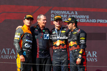 2023-07-23 - Podium: from left to right Lando Norris (GBR) McLaren MCL60 Max Verstappen (NED) Redbull Racing RB19 Paul Monegan (GBR) Technical Director Oracle Red Bull Racing Sergio Perez (MEX) Redbull Racing RB19 - 2023 FORMULA 1 QATAR AIRWAYS HUNGARIAN GRAND PRIX, FORMULA ONE WORLD CHAMPIONSHIP - RACE - FORMULA 1 - MOTORS