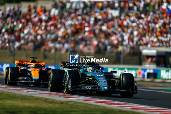 2023-07-22 - 14 ALONSO Fernando (spa), Aston Martin F1 Team AMR23, 81 PIASTRI Oscar (aus), McLaren F1 Team MCL60, action during the 2023 Formula 1 Qatar Airways Hungarian Grand Prix, 11th round of the 2023 Formula One World Championship from July 21 to 23, 2023 on the Hungaroring, in Mogyorod, Hungary - F1 - HUNGARIAN GRAND PRIX 2023 - FORMULA 1 - MOTORS