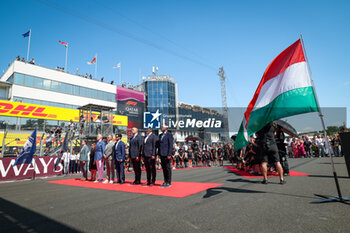 2023-07-23 - National anthem on the starting grid: BEN SULAYEM Mohammed (uae), President of the FIA, DOMENICALI Stefano (ita), Chairman and CEO Formula One Group FOG, during the 2023 Formula 1 Qatar Airways Hungarian Grand Prix, 11th round of the 2023 Formula One World Championship from July 21 to 23, 2023 on the Hungaroring, in Mogyorod, Hungary - F1 - HUNGARIAN GRAND PRIX 2023 - RACE - FORMULA 1 - MOTORS