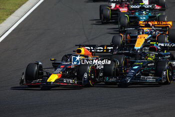 2023-07-23 - Start of the race: 01 VERSTAPPEN Max (nld), Red Bull Racing RB19, 44 HAMILTON Lewis (gbr), Mercedes AMG F1 Team W14, action during the 2023 Formula 1 Qatar Airways Hungarian Grand Prix, 11th round of the 2023 Formula One World Championship from July 21 to 23, 2023 on the Hungaroring, in Mogyorod, Hungary - F1 - HUNGARIAN GRAND PRIX 2023 - RACE - FORMULA 1 - MOTORS