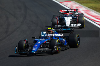 2023-07-23 - 02 SARGEANT Logan (usa), Williams Racing FW45, 03 RICCIARDO Daniel (aus), Scuderia AlphaTauri AT04, action during the 2023 Formula 1 Qatar Airways Hungarian Grand Prix, 11th round of the 2023 Formula One World Championship from July 21 to 23, 2023 on the Hungaroring, in Mogyorod, Hungary - F1 - HUNGARIAN GRAND PRIX 2023 - RACE - FORMULA 1 - MOTORS