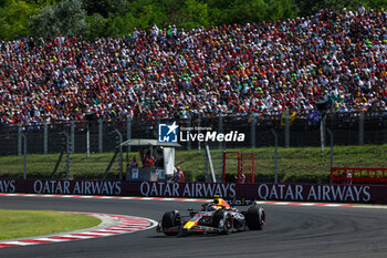 2023-07-23 - 11 PEREZ Sergio (mex), Red Bull Racing RB19, action during the 2023 Formula 1 Qatar Airways Hungarian Grand Prix, 11th round of the 2023 Formula One World Championship from July 21 to 23, 2023 on the Hungaroring, in Mogyorod, Hungary - F1 - HUNGARIAN GRAND PRIX 2023 - RACE - FORMULA 1 - MOTORS