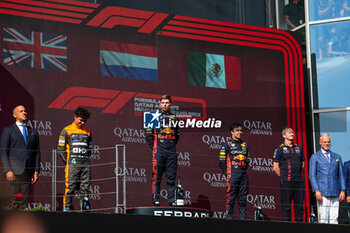 2023-07-23 - Podium: VERSTAPPEN Max (ned), Red Bull Racing RB19, NORRIS Lando (gbr), McLaren F1 Team MCL60, PEREZ Sergio (mex), Red Bull Racing RB19, portrait during the 2023 Formula 1 Qatar Airways Hungarian Grand Prix, 11th round of the 2023 Formula One World Championship from July 21 to 23, 2023 on the Hungaroring, in Mogyorod, Hungary - F1 - HUNGARIAN GRAND PRIX 2023 - RACE - FORMULA 1 - MOTORS