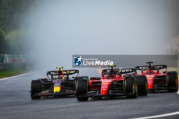 2023-07-29 - 11 PEREZ Sergio (mex), Red Bull Racing RB19, 55 SAINZ Carlos (spa), Scuderia Ferrari SF-23, 16 LECLERC Charles (mco), Scuderia Ferrari SF-23, action during the 2023 Formula 1 MSC Cruises Belgian Grand Prix, 12th round of the 2023 Formula One World Championship from July 28 to 30, 2023 on the Circuit de Spa-Francorchamps, in Stavelot, Belgium - F1 - BELGIAN GRAND PRIX 2023 - FORMULA 1 - MOTORS