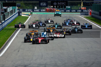 2023-07-30 - Start of the race: 16 LECLERC Charles (mco), Scuderia Ferrari SF-23, 11 PEREZ Sergio (mex), Red Bull Racing RB19, 44 HAMILTON Lewis (gbr), Mercedes AMG F1 Team W14, 55 SAINZ Carlos (spa), Scuderia Ferrari SF-23, action, during the 2023 Formula 1 MSC Cruises Belgian Grand Prix, 12th round of the 2023 Formula One World Championship from July 28 to 30, 2023 on the Circuit de Spa-Francorchamps, in Stavelot, Belgium - F1 - BELGIAN GRAND PRIX 2023 - RACE - FORMULA 1 - MOTORS