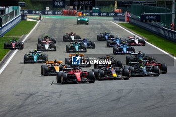 2023-07-30 - Start of the race: 16 LECLERC Charles (mco), Scuderia Ferrari SF-23, 11 PEREZ Sergio (mex), Red Bull Racing RB19, 44 HAMILTON Lewis (gbr), Mercedes AMG F1 Team W14, 55 SAINZ Carlos (spa), Scuderia Ferrari SF-23, action, during the 2023 Formula 1 MSC Cruises Belgian Grand Prix, 12th round of the 2023 Formula One World Championship from July 28 to 30, 2023 on the Circuit de Spa-Francorchamps, in Stavelot, Belgium - F1 - BELGIAN GRAND PRIX 2023 - RACE - FORMULA 1 - MOTORS