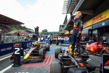 2023-07-30 - VERSTAPPEN Max (ned), Red Bull Racing RB19, celebrating victory next to PEREZ Sergio (mex), Red Bull Racing RB19, portrait during the 2023 Formula 1 MSC Cruises Belgian Grand Prix, 12th round of the 2023 Formula One World Championship from July 28 to 30, 2023 on the Circuit de Spa-Francorchamps, in Stavelot, Belgium - F1 - BELGIAN GRAND PRIX 2023 - RACE - FORMULA 1 - MOTORS