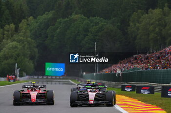 2023-07-30 - 55 SAINZ Carlos (spa), Scuderia Ferrari SF-23, 24 ZHOU Guanyu (chi), Alfa Romeo F1 Team Stake C43, action during the 2023 Formula 1 MSC Cruises Belgian Grand Prix, 12th round of the 2023 Formula One World Championship from July 28 to 30, 2023 on the Circuit de Spa-Francorchamps, in Stavelot, Belgium - F1 - BELGIAN GRAND PRIX 2023 - RACE - FORMULA 1 - MOTORS