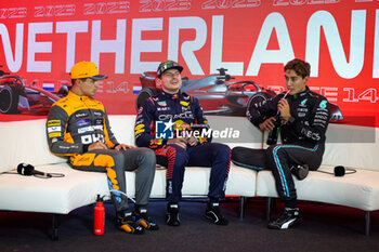 2023-08-26 - Press conference: NORRIS Lando (gbr), McLaren F1 Team MCL60, VERSTAPPEN Max (ned), Red Bull Racing RB19, RUSSELL George (gbr), Mercedes AMG F1 Team W14, portrait, during the 2023 Formula 1 Heineken Dutch Grand Prix, 13th round of the 2023 Formula One World Championship from August 25 to 28, 2023 on the Zandvoort Circuit, in Zandvoort, Netherlands - F1 - DUTCH GRAND PRIX 2023 - FORMULA 1 - MOTORS