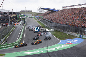 2023-08-27 - 01 VERSTAPPEN Max (nld), Red Bull Racing RB19, action, start with 04 NORRIS Lando (gbr), McLaren F1 Team MCL60 during the dutch hymn prior to the start during the 2023 Formula 1 Heineken Dutch Grand Prix, 13th round of the 2023 Formula One World Championship from August 25 to 28, 2023 on the Zandvoort Circuit, in Zandvoort, Netherlands - F1 - DUTCH GRAND PRIX 2023 - RACE - FORMULA 1 - MOTORS