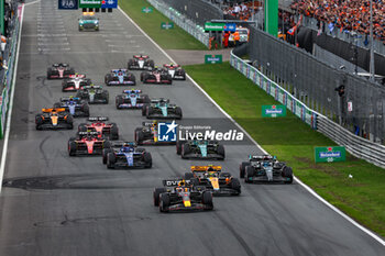2023-08-27 - The start of the race: 01 VERSTAPPEN Max (nld), Red Bull Racing RB19, 04 NORRIS Lando (gbr), McLaren F1 Team MCL60, 63 RUSSELL George (gbr), Mercedes AMG F1 Team W14, action during the 2023 Formula 1 Heineken Dutch Grand Prix, 13th round of the 2023 Formula One World Championship from August 25 to 28, 2023 on the Zandvoort Circuit, in Zandvoort, Netherlands - F1 - DUTCH GRAND PRIX 2023 - RACE - FORMULA 1 - MOTORS
