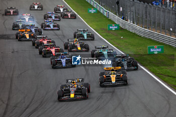 2023-08-27 - The start of the race: 01 VERSTAPPEN Max (nld), Red Bull Racing RB19, 04 NORRIS Lando (gbr), McLaren F1 Team MCL60, 63 RUSSELL George (gbr), Mercedes AMG F1 Team W14, action during the 2023 Formula 1 Heineken Dutch Grand Prix, 13th round of the 2023 Formula One World Championship from August 25 to 28, 2023 on the Zandvoort Circuit, in Zandvoort, Netherlands - F1 - DUTCH GRAND PRIX 2023 - RACE - FORMULA 1 - MOTORS