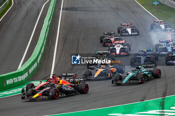 2023-08-27 - 11 PEREZ Sergio (mex), Red Bull Racing RB19, 16 LECLERC Charles (mco), Scuderia Ferrari SF-23, 18 STROLL Lance (can), Aston Martin F1 Team AMR23, action during the 2023 Formula 1 Heineken Dutch Grand Prix, 13th round of the 2023 Formula One World Championship from August 25 to 28, 2023 on the Zandvoort Circuit, in Zandvoort, Netherlands - F1 - DUTCH GRAND PRIX 2023 - RACE - FORMULA 1 - MOTORS