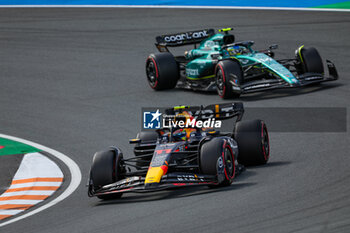 2023-08-27 - 11 PEREZ Sergio (mex), Red Bull Racing RB19, 14 ALONSO Fernando (spa), Aston Martin F1 Team AMR23, action during the 2023 Formula 1 Heineken Dutch Grand Prix, 13th round of the 2023 Formula One World Championship from August 25 to 28, 2023 on the Zandvoort Circuit, in Zandvoort, Netherlands - F1 - DUTCH GRAND PRIX 2023 - RACE - FORMULA 1 - MOTORS