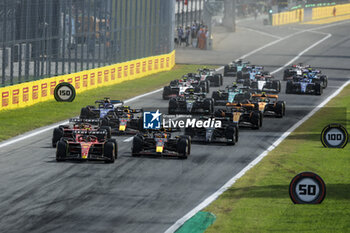 2023-09-03 - start of the race, depart, 55 SAINZ Carlos (spa), Scuderia Ferrari SF-23, action 01 VERSTAPPEN Max (nld), Red Bull Racing RB19, action during the 2023 Formula 1 Pirelli Grand Premio d’Italia Grand Prix, 14th round of the 2023 Formula One World Championship from September 1 to 3, 2023 on the Autodromo Nazionale di Monza, in Monza, Italy - F1 - ITALIAN GRAND PRIX 2023 - RACE - FORMULA 1 - MOTORS