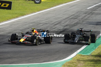 2023-09-03 - 11 PEREZ Sergio (mex), Red Bull Racing RB19, action 63 RUSSELL George (gbr), Mercedes AMG F1 Team W14, action during the 2023 Formula 1 Pirelli Grand Premio d’Italia Grand Prix, 14th round of the 2023 Formula One World Championship from September 1 to 3, 2023 on the Autodromo Nazionale di Monza, in Monza, Italy - F1 - ITALIAN GRAND PRIX 2023 - RACE - FORMULA 1 - MOTORS
